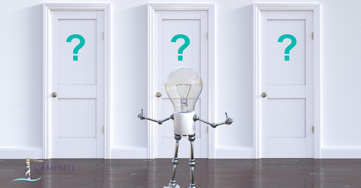 A light bulb in front of 3 doors